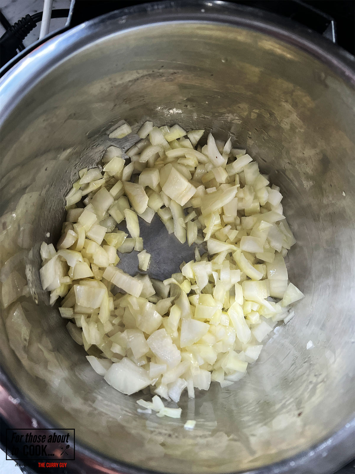 frying onions in a multi-cooker