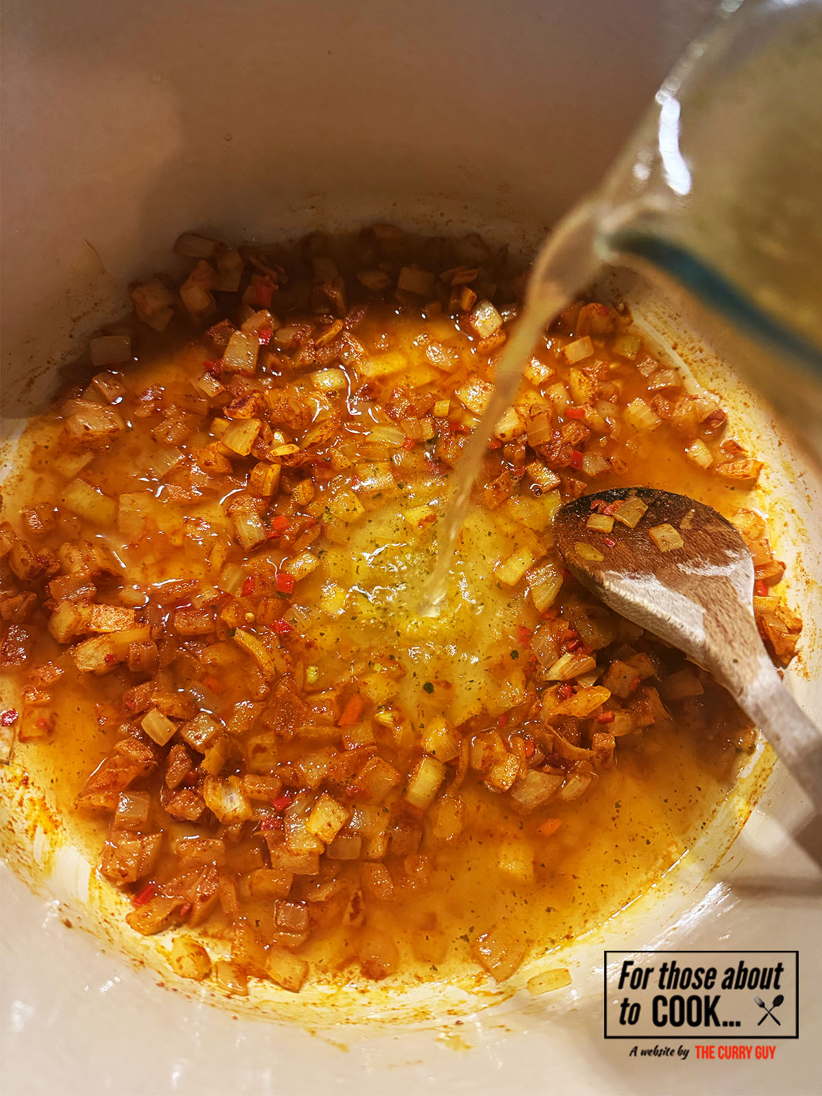 Vegetable stock added to the pot
