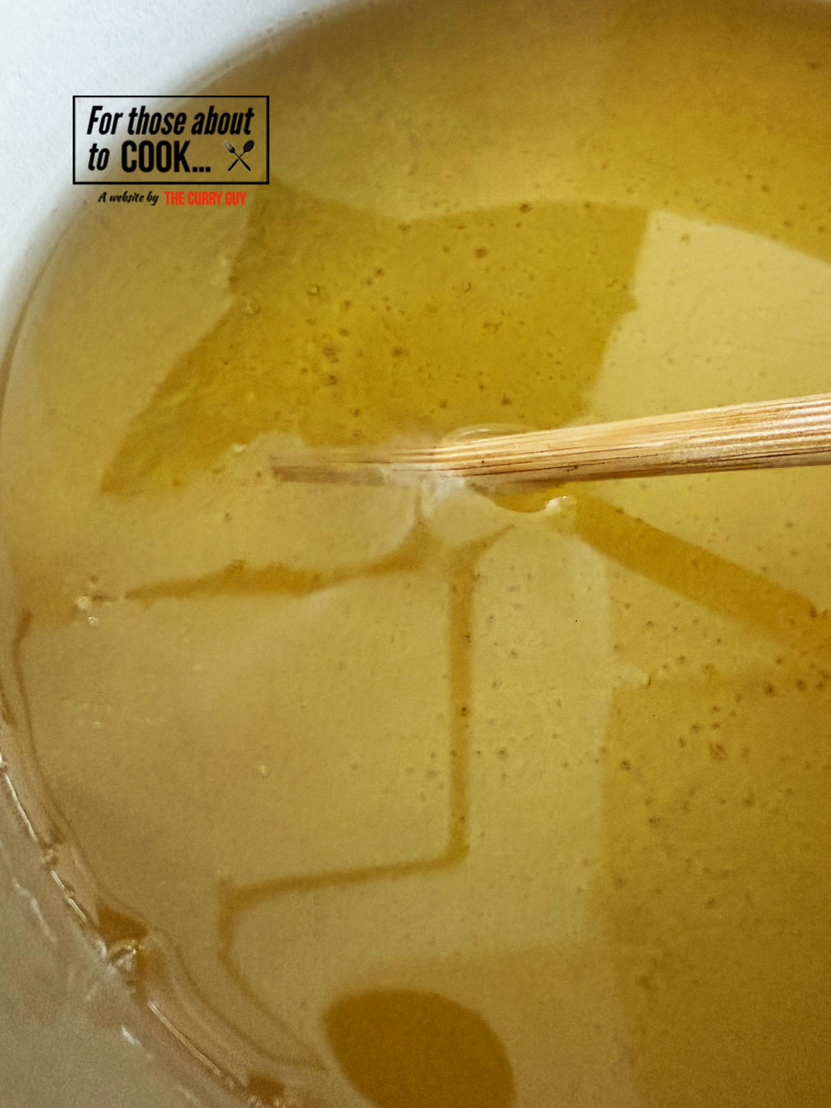 Preparing the oil to fry the onions