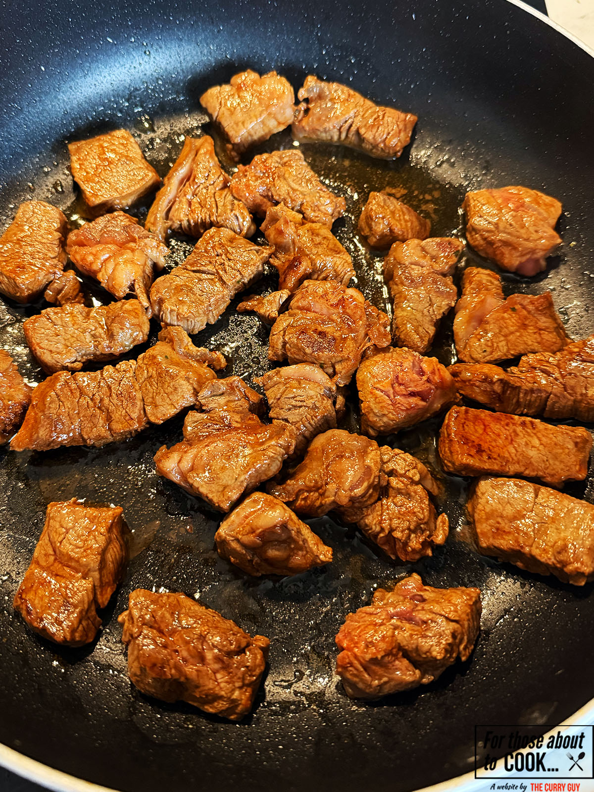Browning the beef in a pan