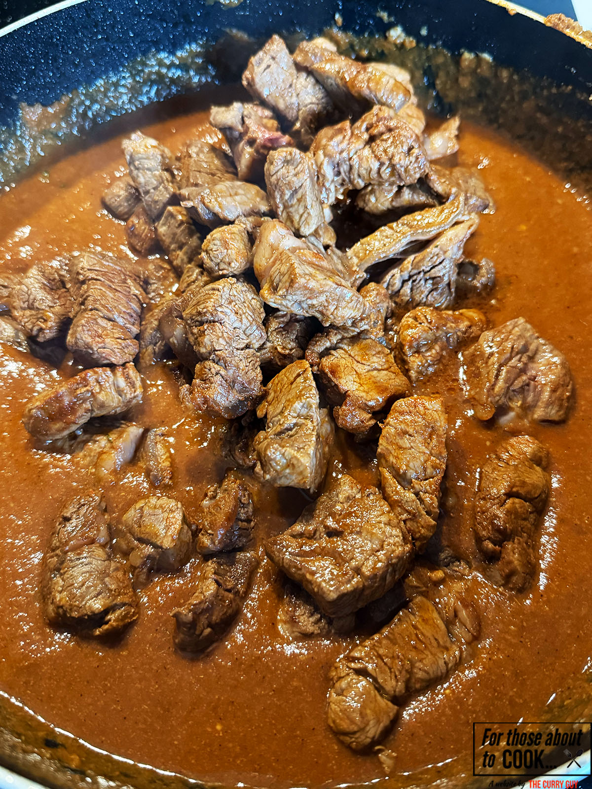 Browned beef returned to the pan