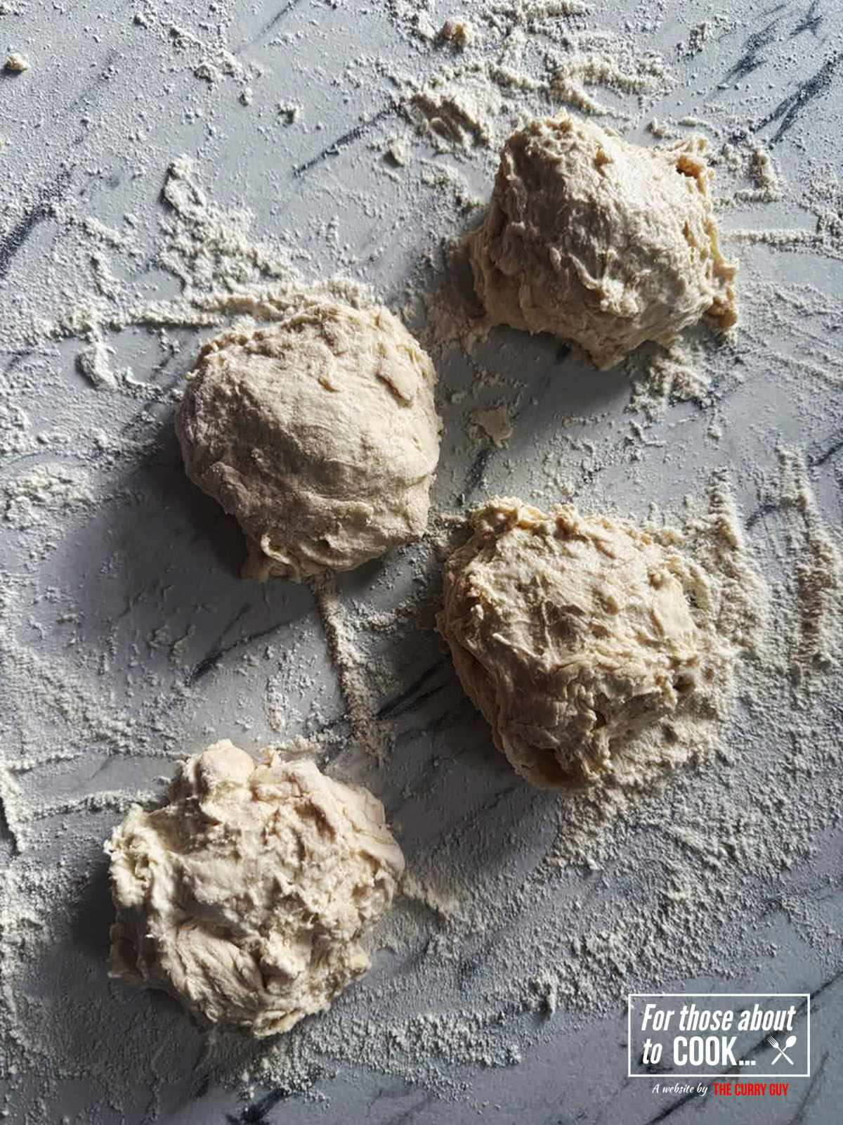 Forming the dough into four smaller dough balls