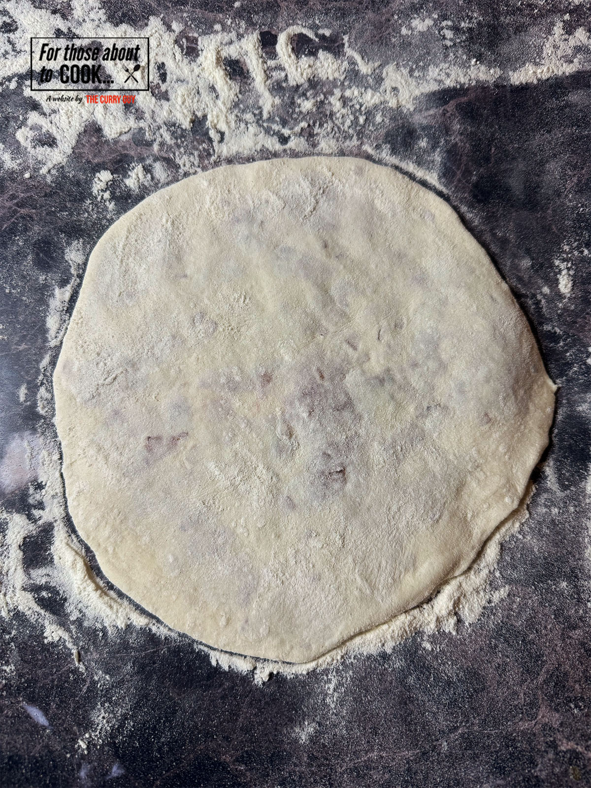 Keema naan rolled out flat ready to fry