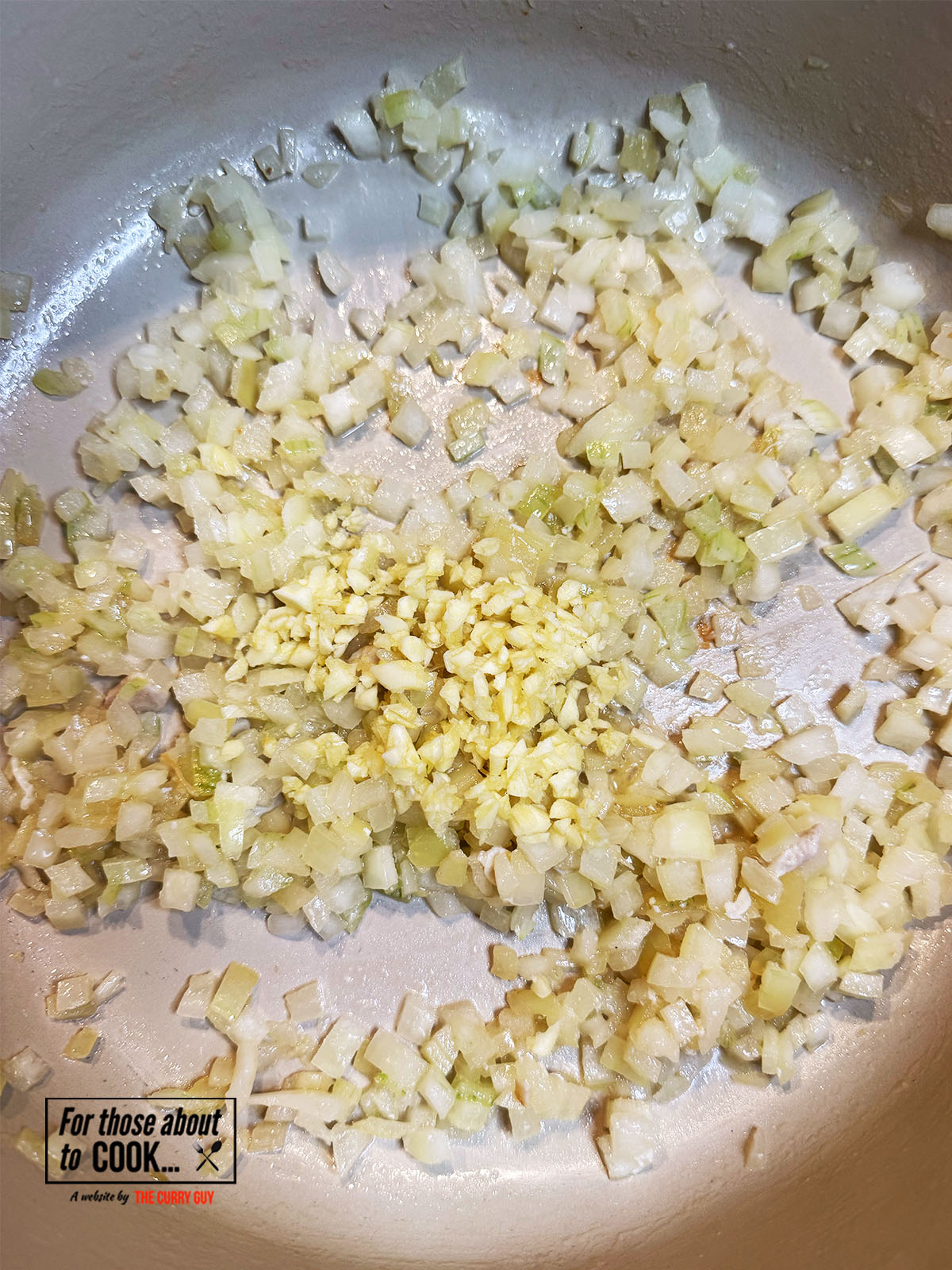 Onions and garlic frying in the pan