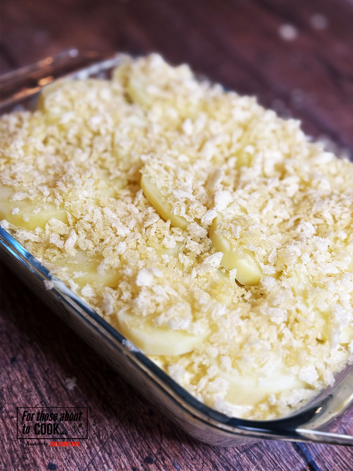 Chicken potato bake topped with sliced potatoes and panko breadcrumbs 