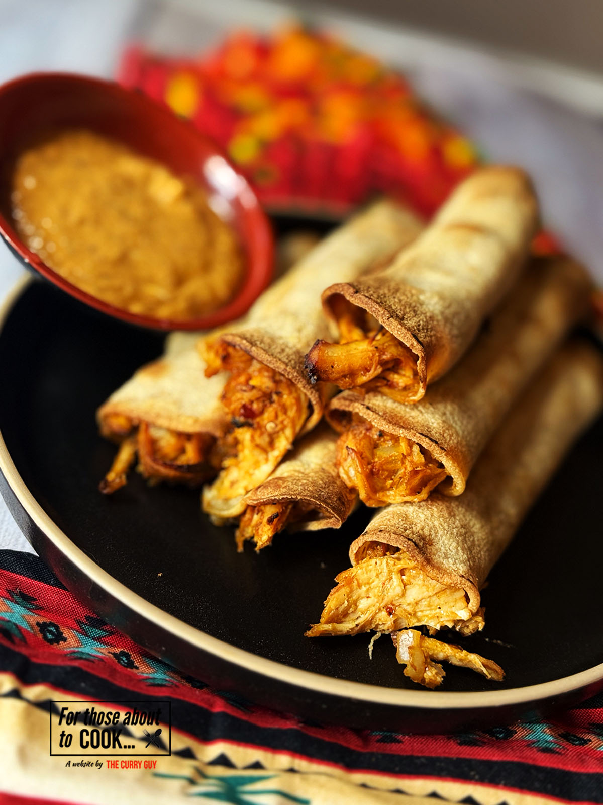 Chipotle chicken taquitos served with chipotle dip