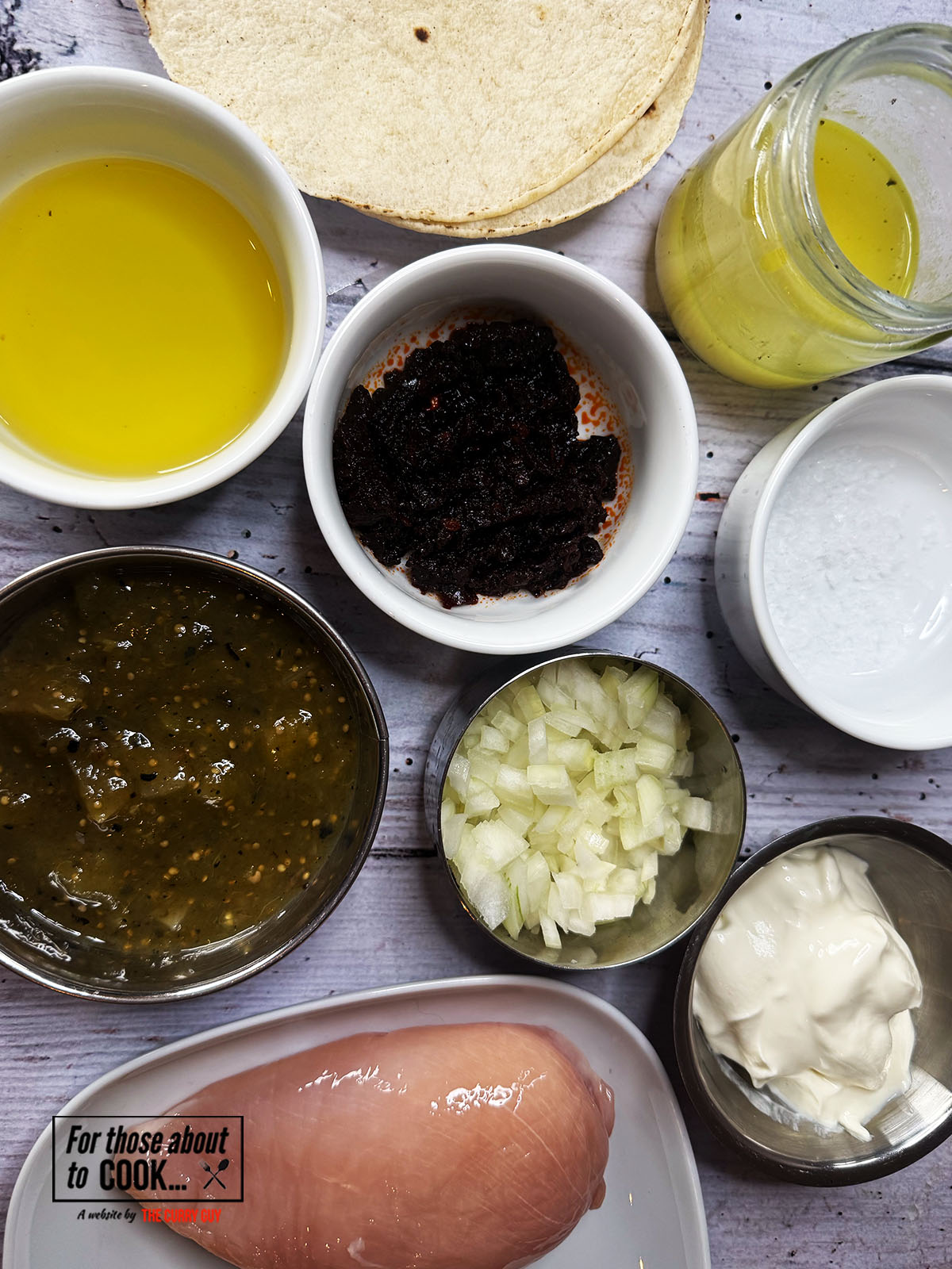Chipotle chicken taquitos ingredients separated into bowls