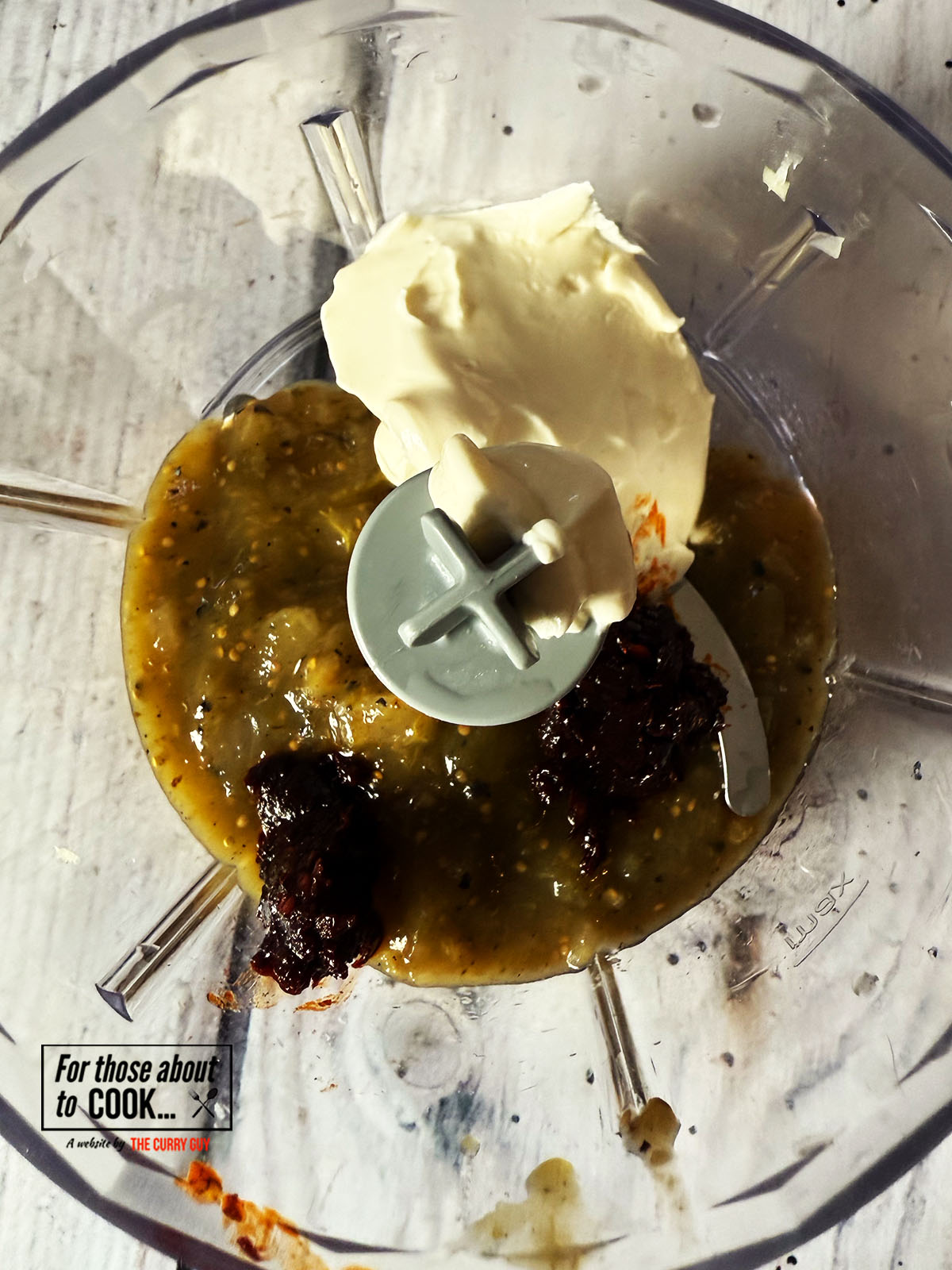 Chipotle paste, cream cheese and salsa verde added to food processor and blitzed