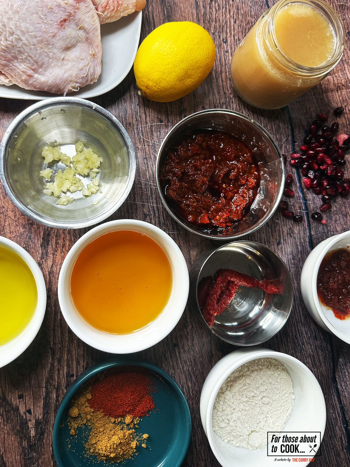 Ingredients for honey harissa chicken separated into bowls