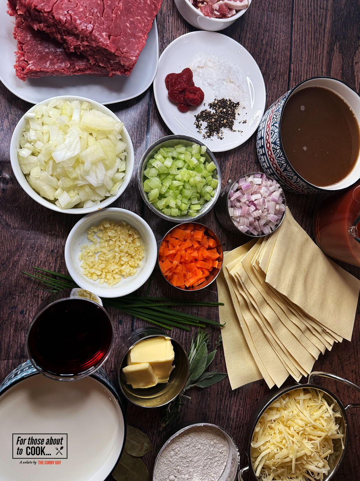 ingredients for lasagne separated into bowls