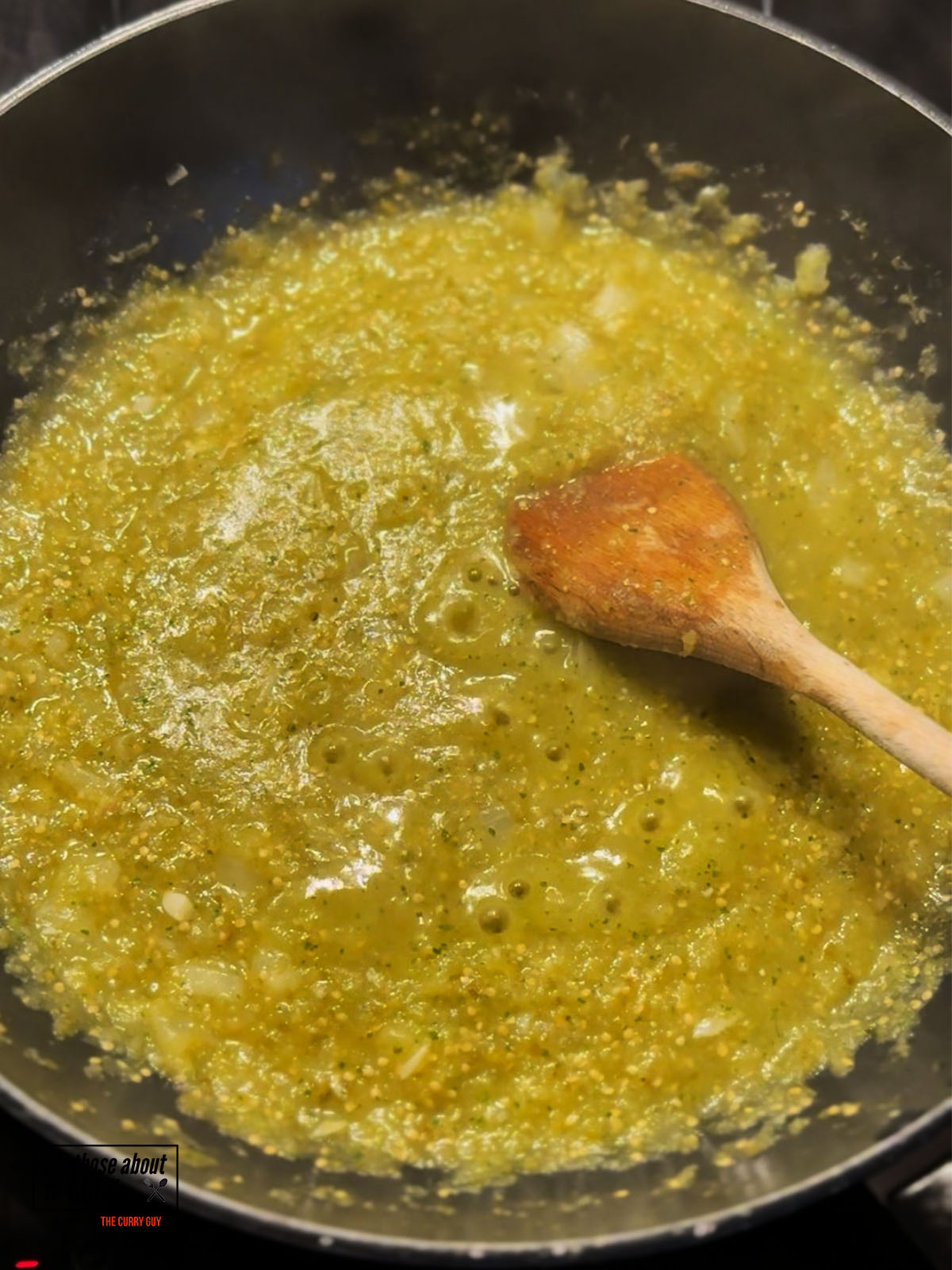 Salsa verde added to the pan and allowed to simmer