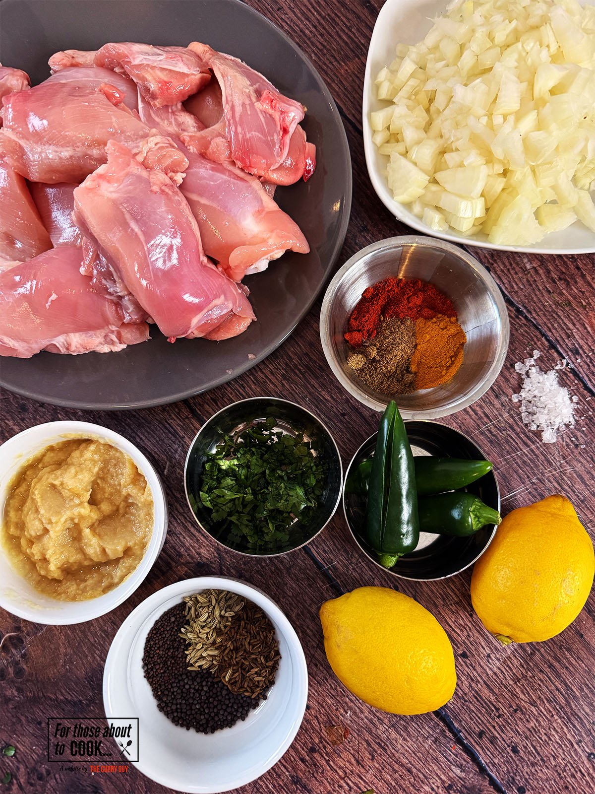 Ingredients for Chicken Achaar separated into bowls