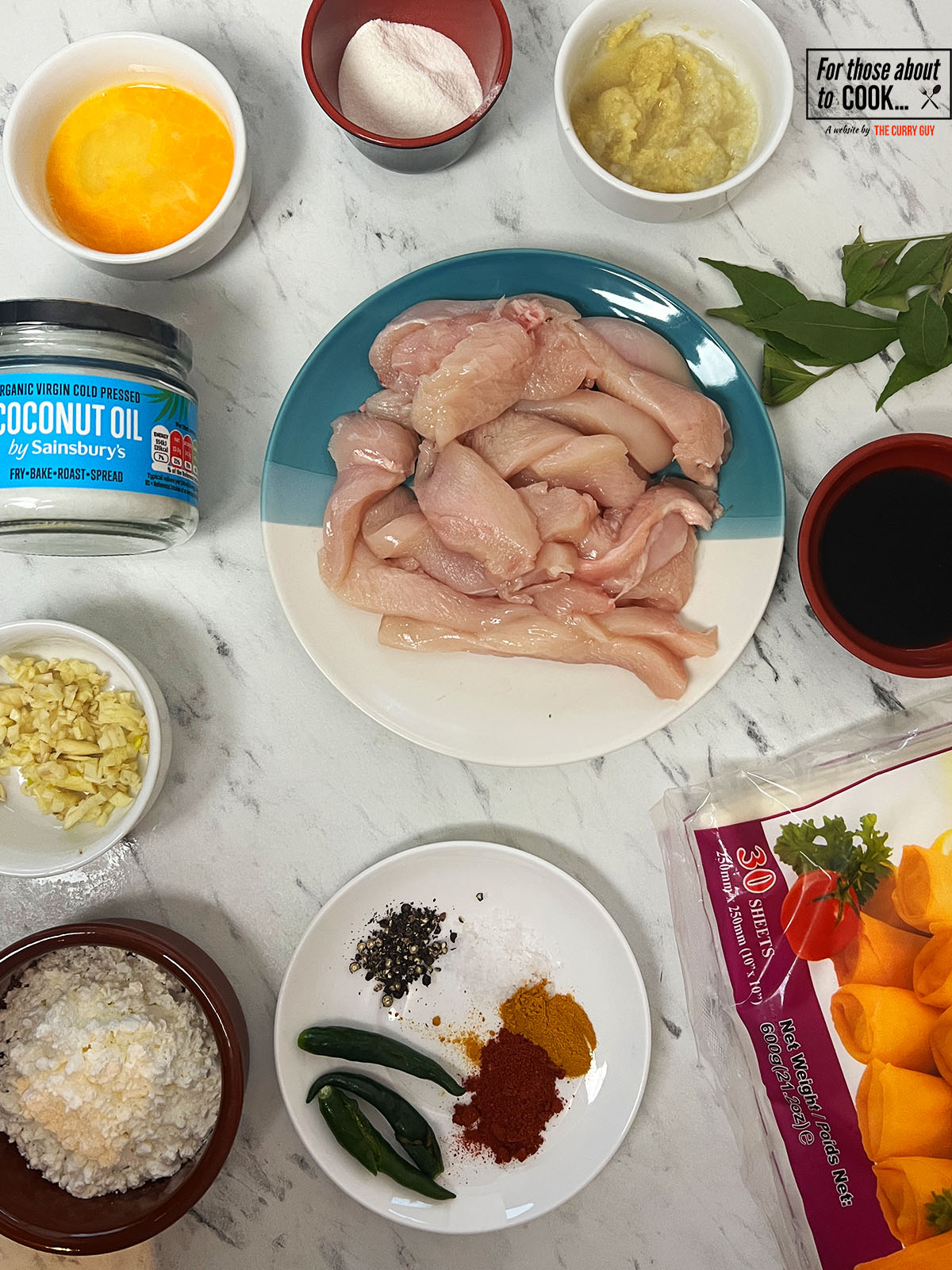 Crispy threaded chicken ingredients separated into bowls