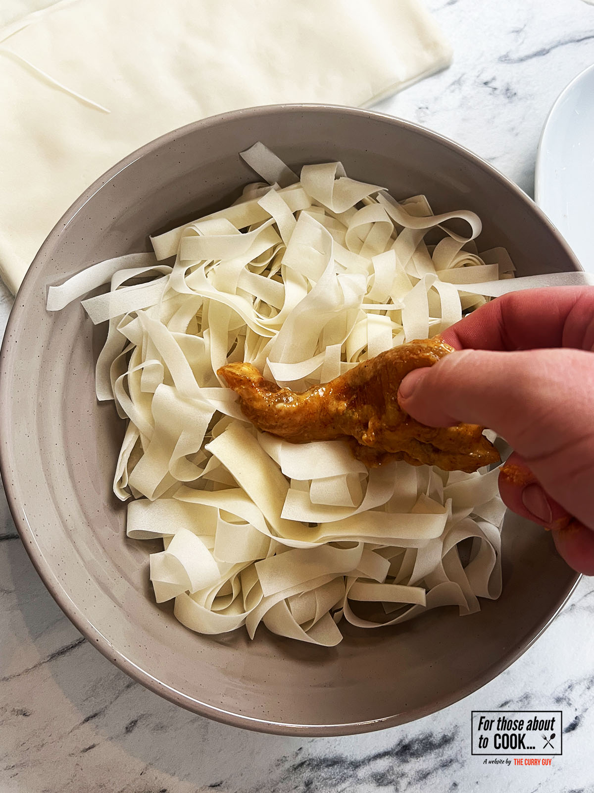Marinated chicken breast placed in the shredded samosa wrappers 