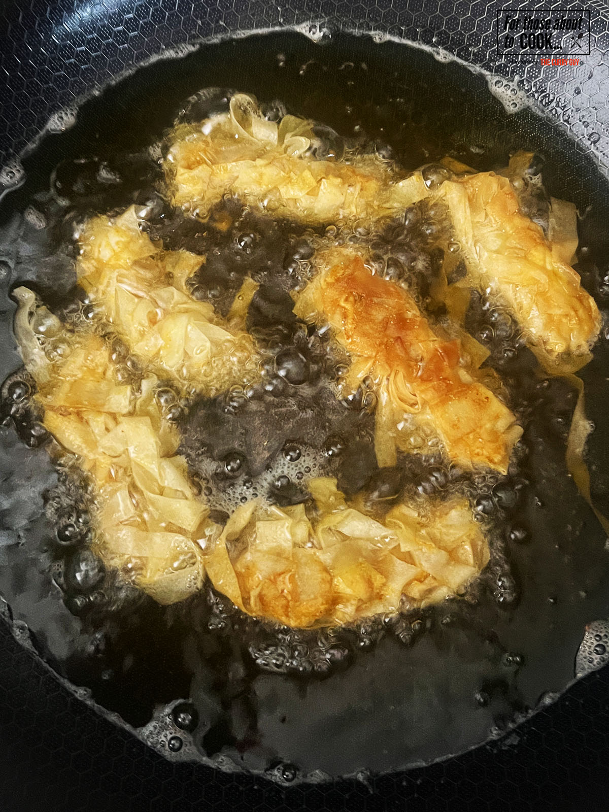Chicken deep frying in the hot oil