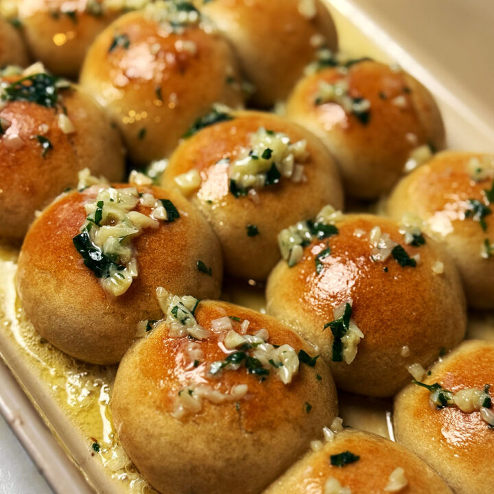 Garlic dough balls served in a baking dish