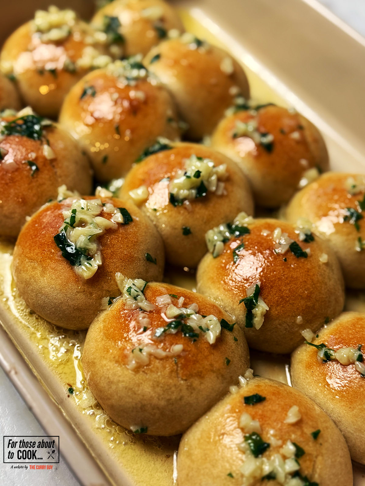 Garlic dough balls served in a baking dish