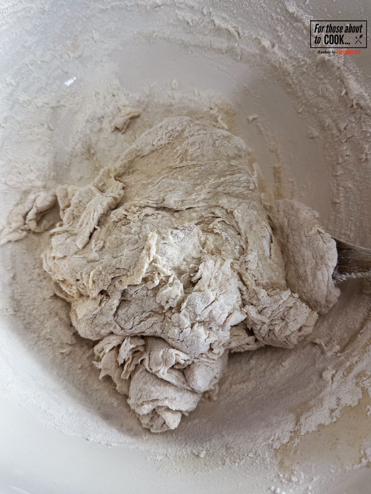 Flour sieved into yeast mixture until a dough is formed