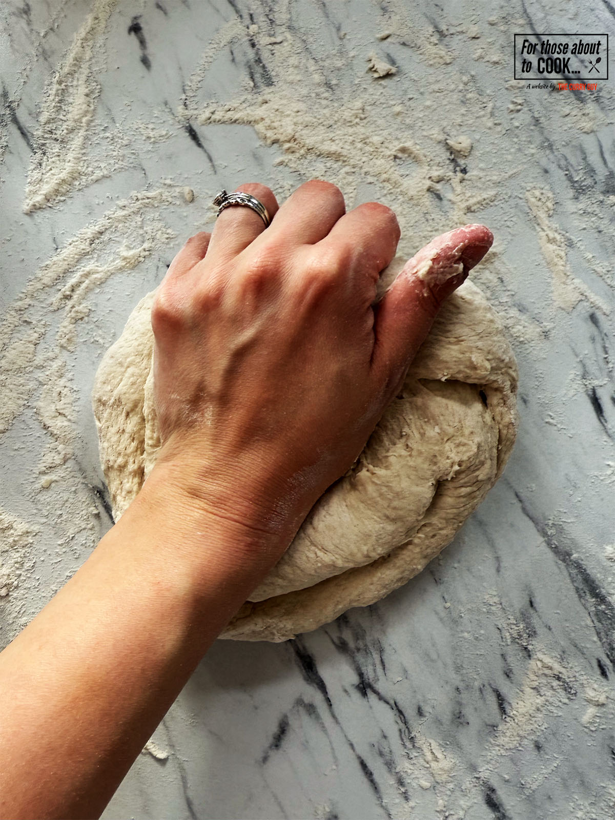 Kneading the dough on a floured surface