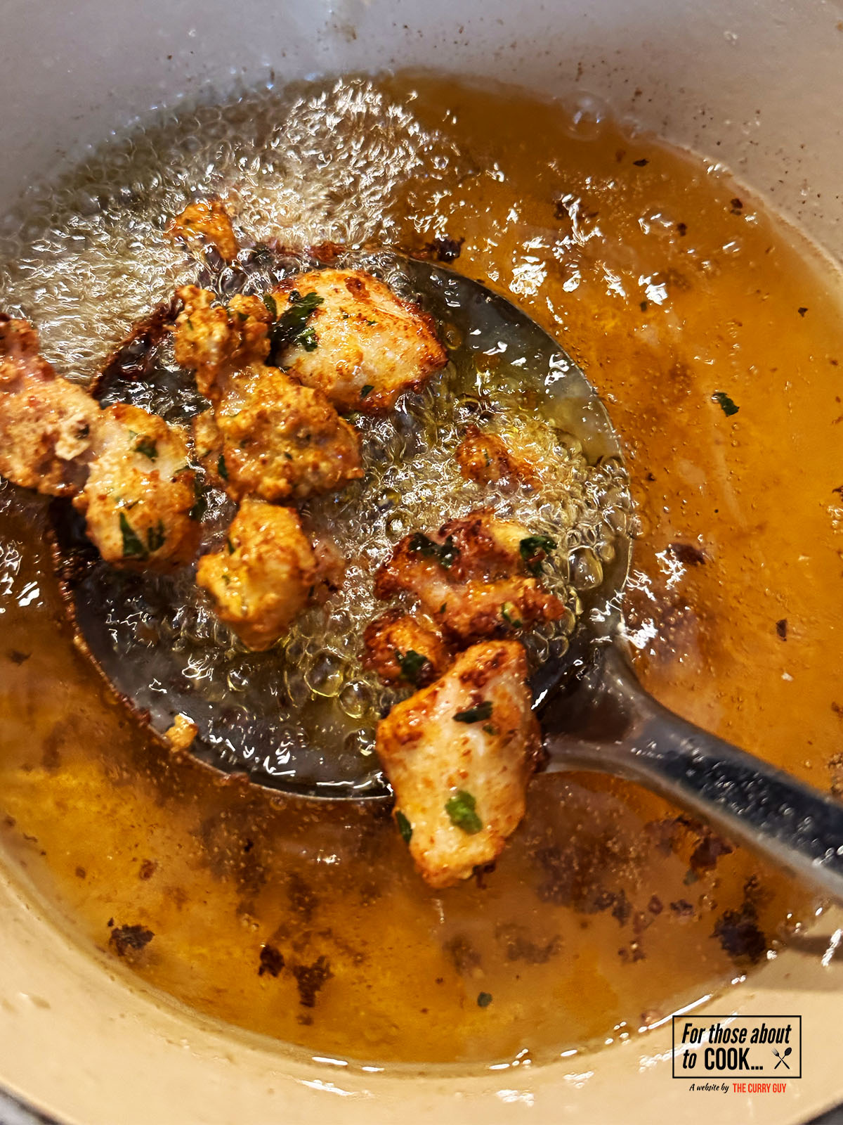 Thigh pieces frying in the pan 
