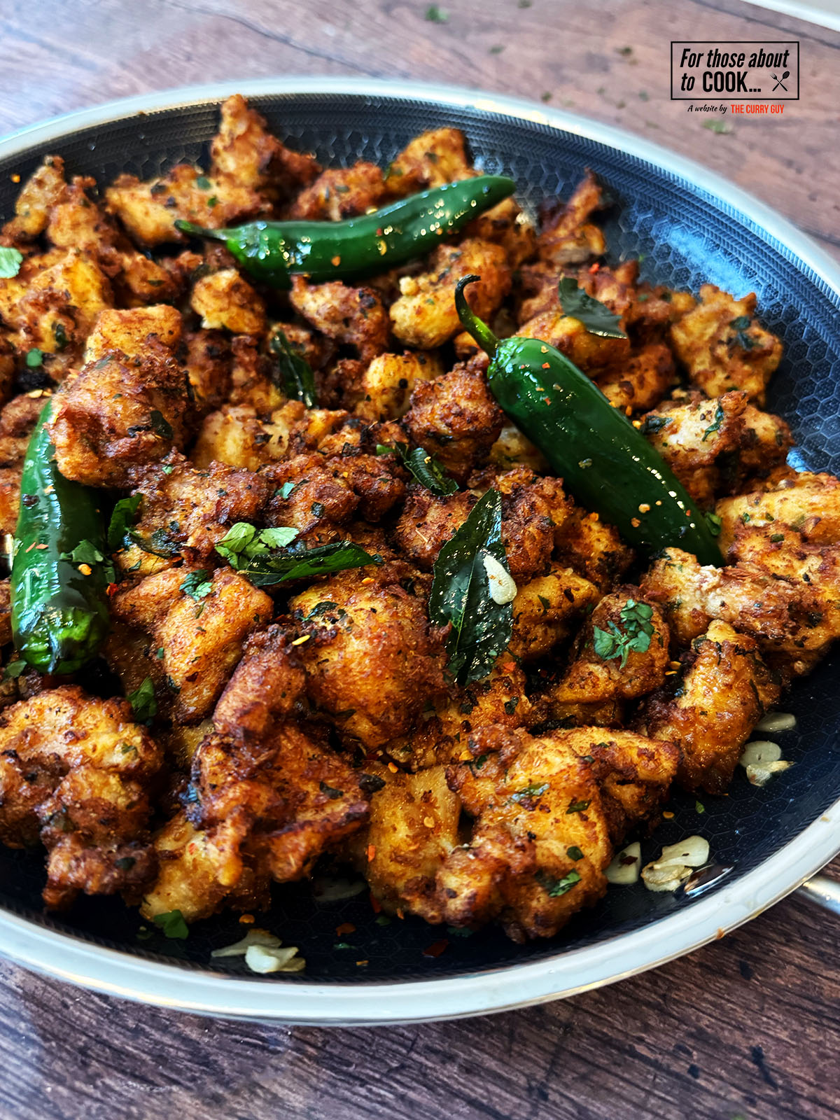 Karumura chicken served in the pan