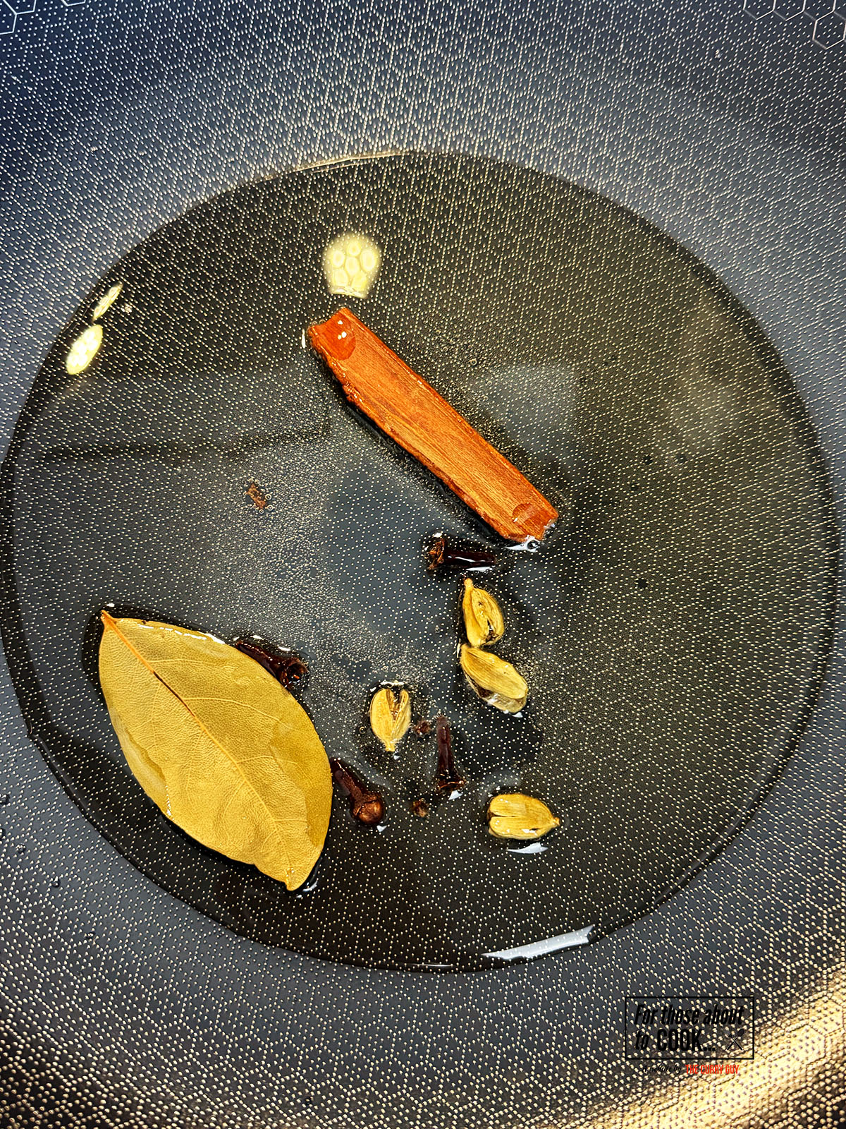 Whole spices frying in oil