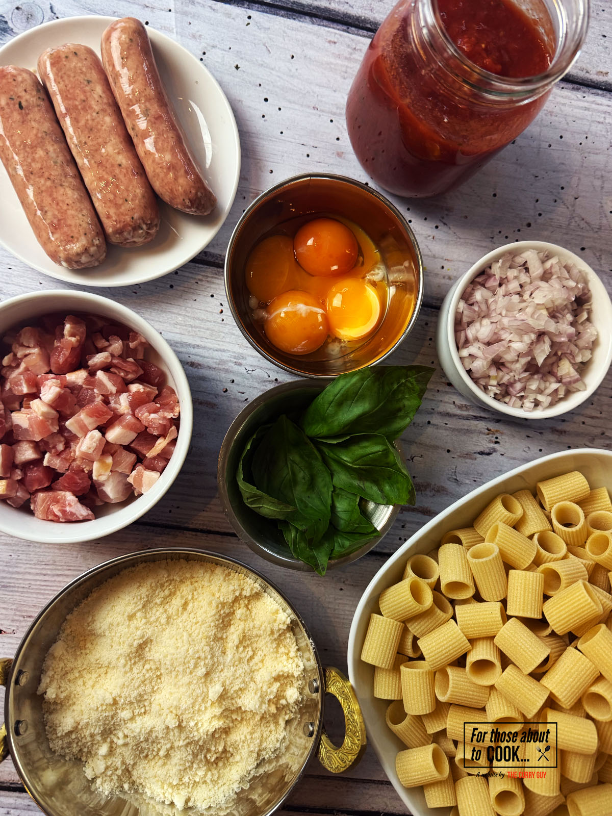 Ingredients for pasta alla zozzona separated into bowls