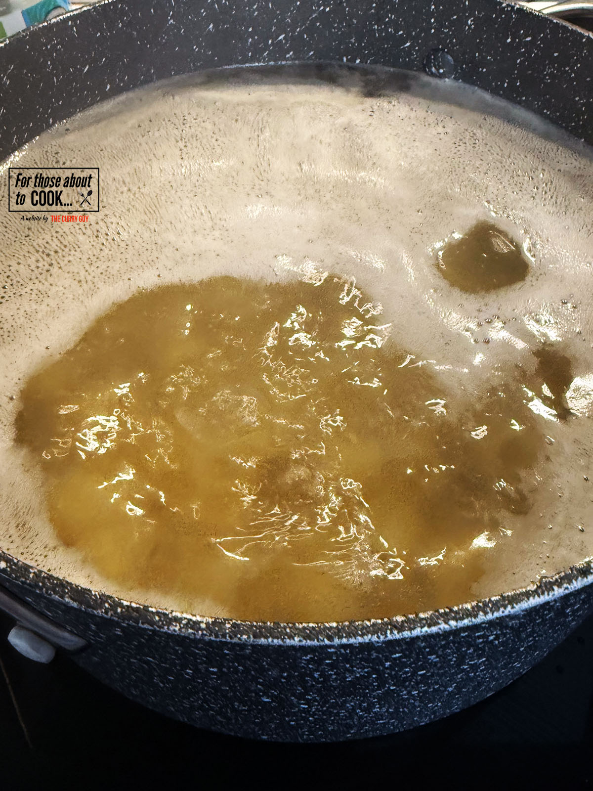 Rigatoni boiling in a pan on water
