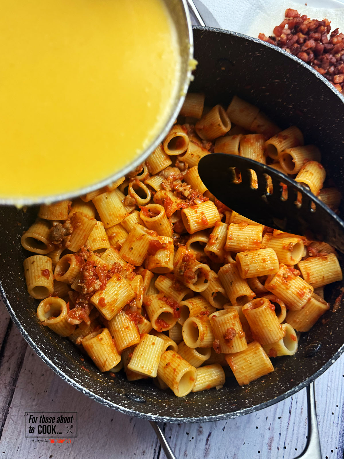 Egg and cheese mixture added to the passata pasta 