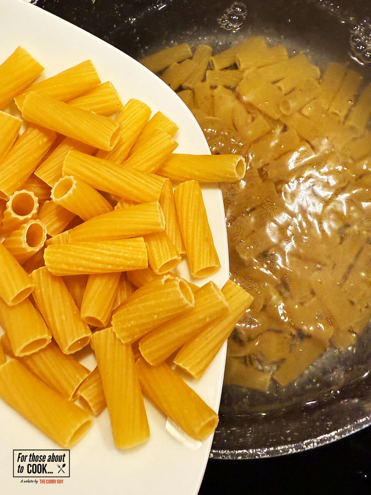 Pasta added to a pot of salted boiling water