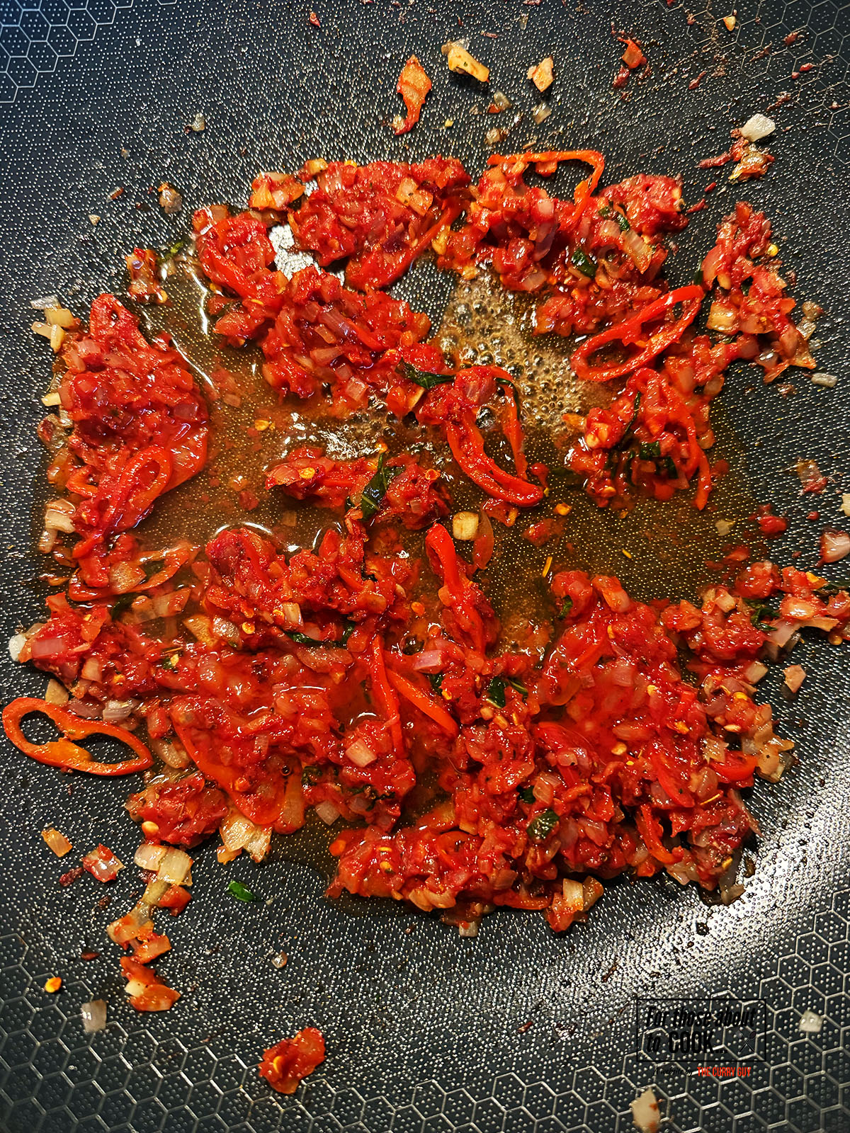 Shot of vodka added to the pan and allowed to reduce