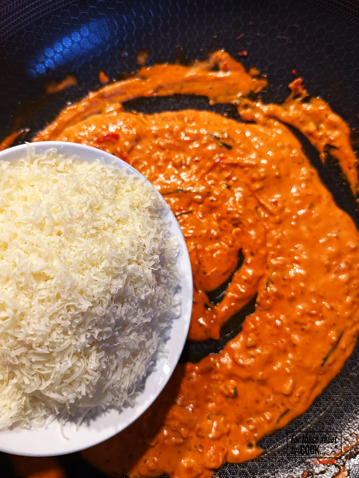 Heavy cream and parmesan cheese added to the vodka sauce