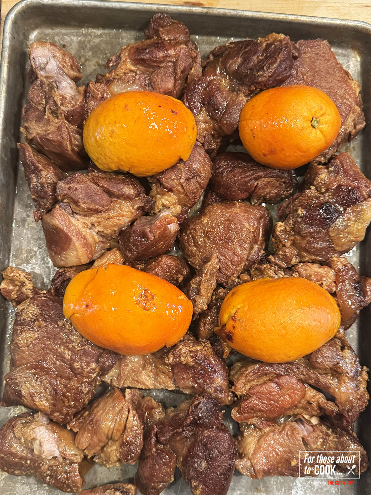 Setting the carnitas to refridgerate