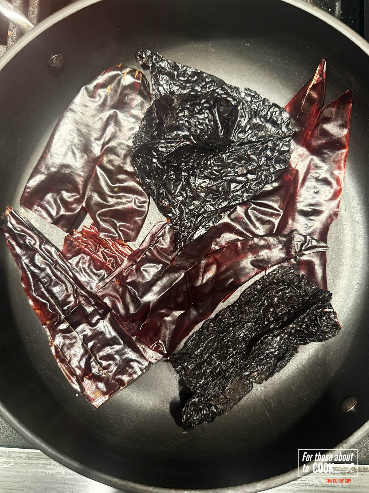 Toasting the chilies for pozole rojo