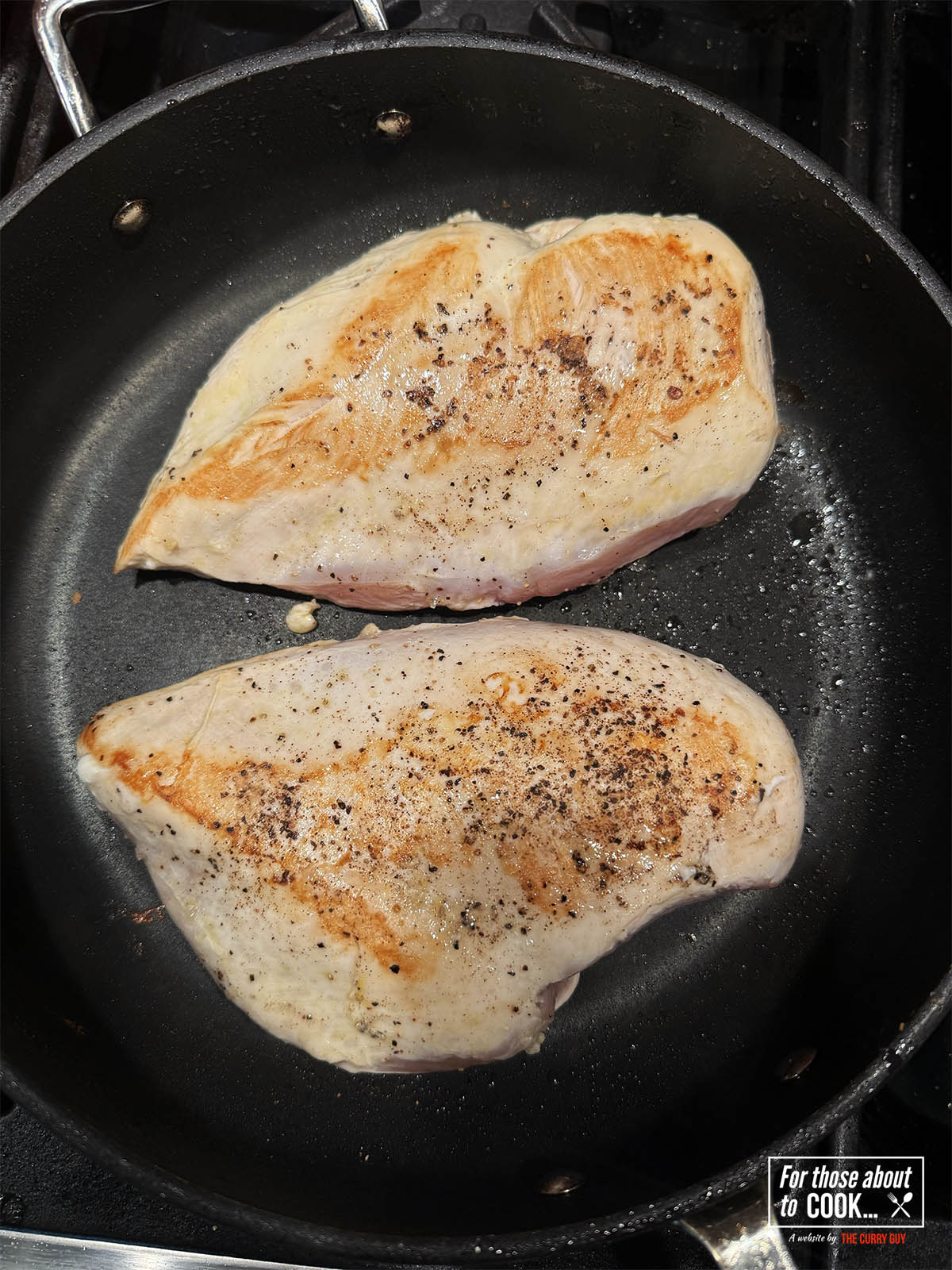 Searing the chicken in the pan 