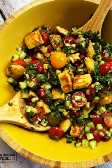 Halloumi Salad served in a large bowl with tahini dressing
