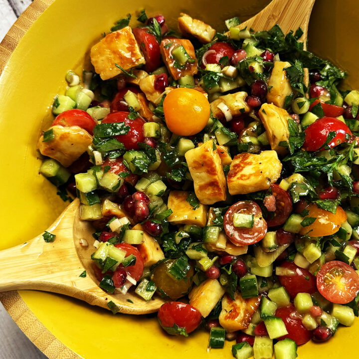Halloumi Salad served in a large bowl with tahini dressing