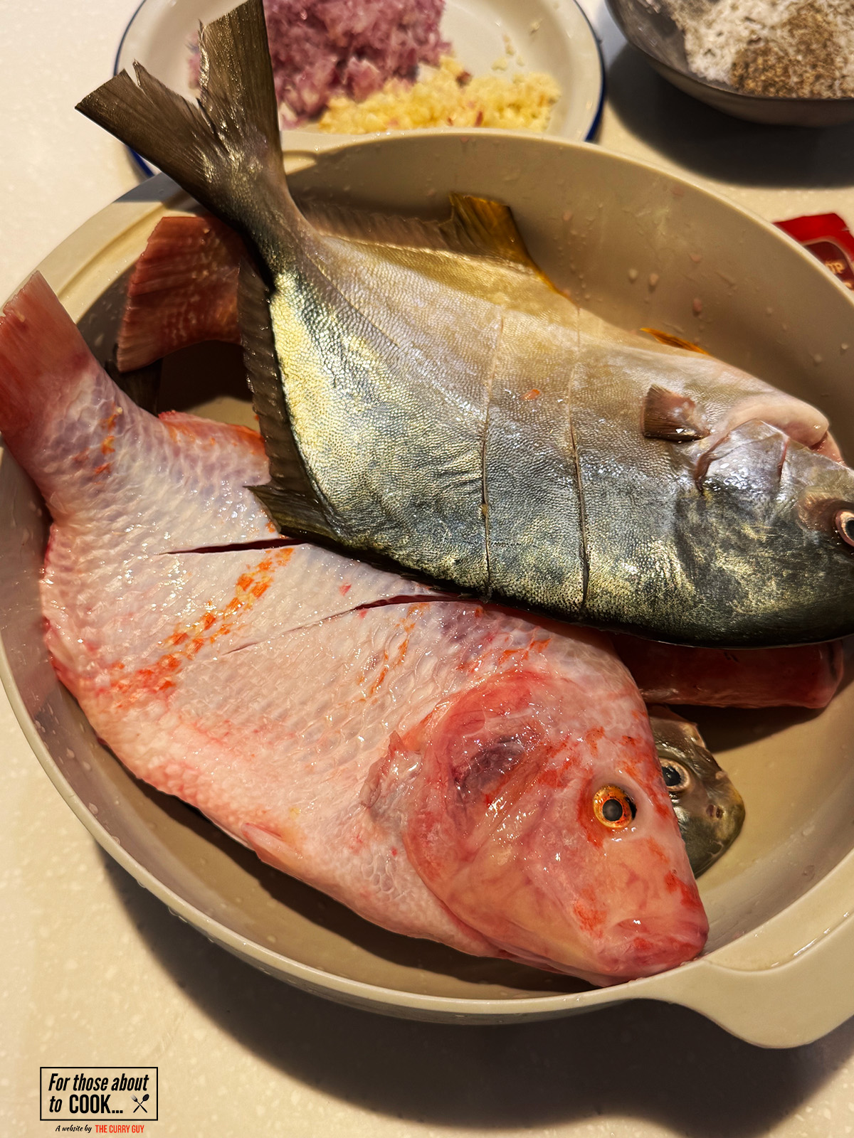 slicing and patting dry the vietnamese fish
