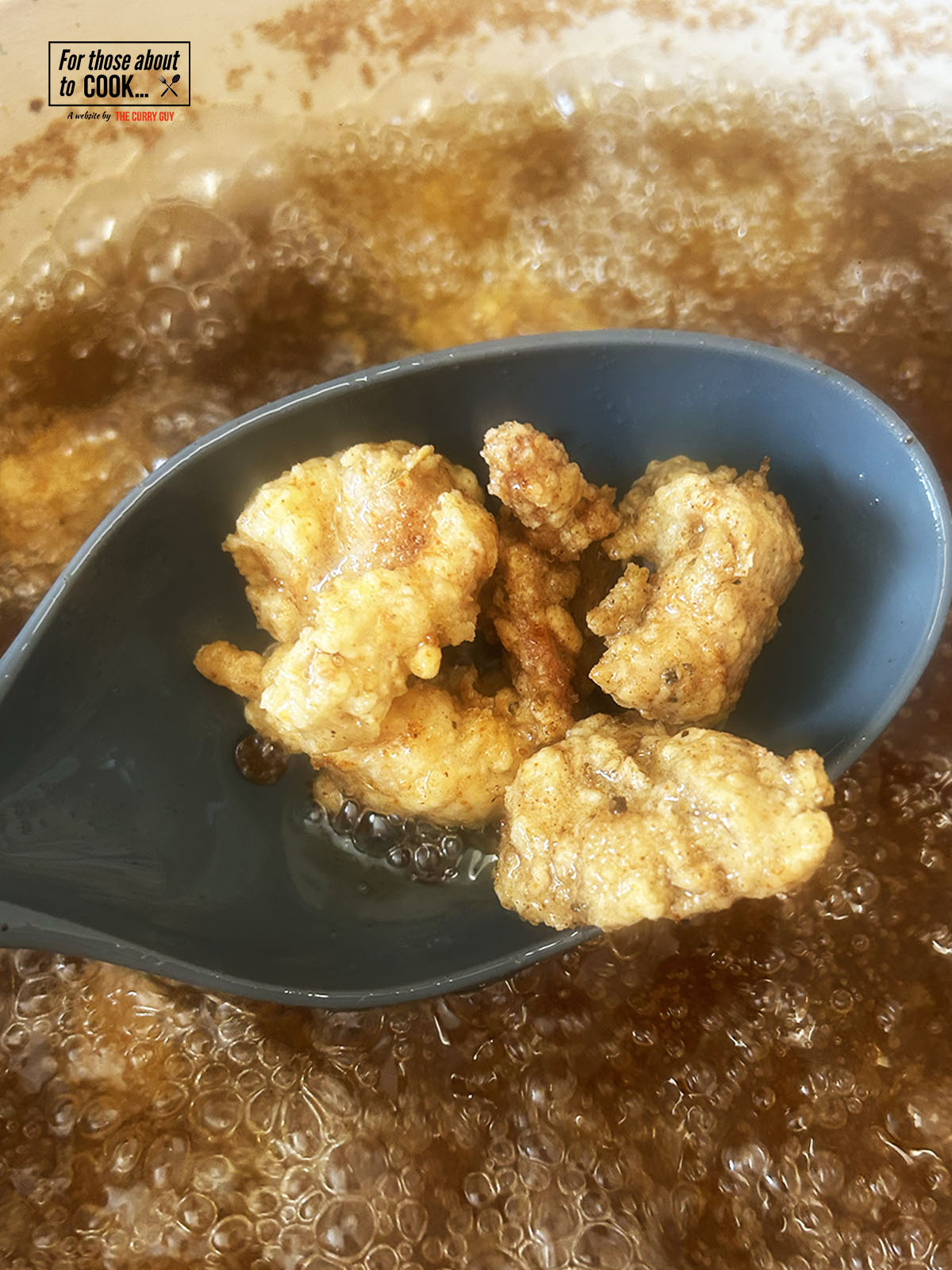 frying the popcorn chicken